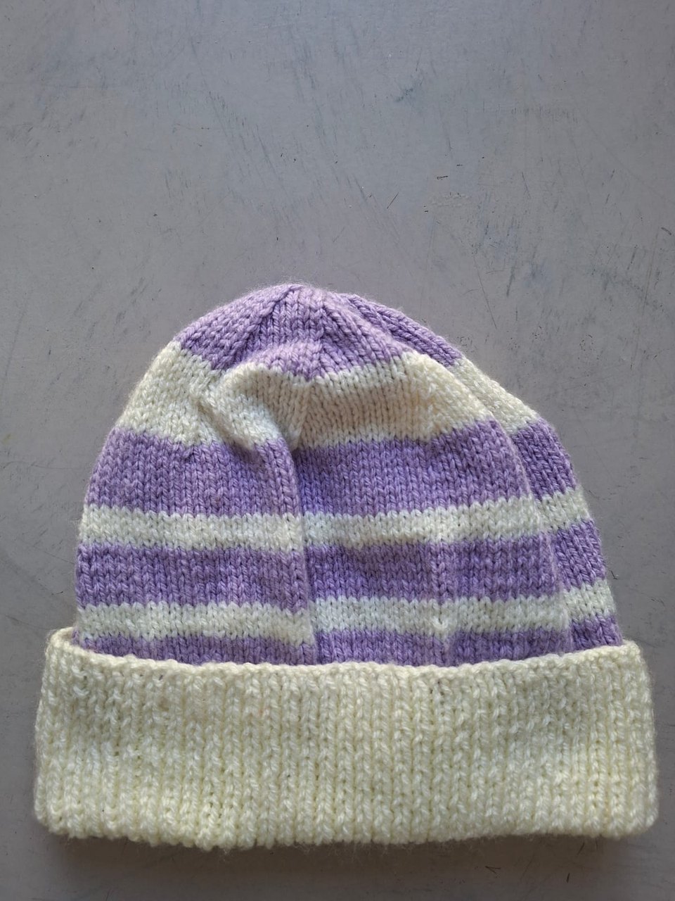 Lilac and cream striped beanie, hand-knitted at Kranshoek